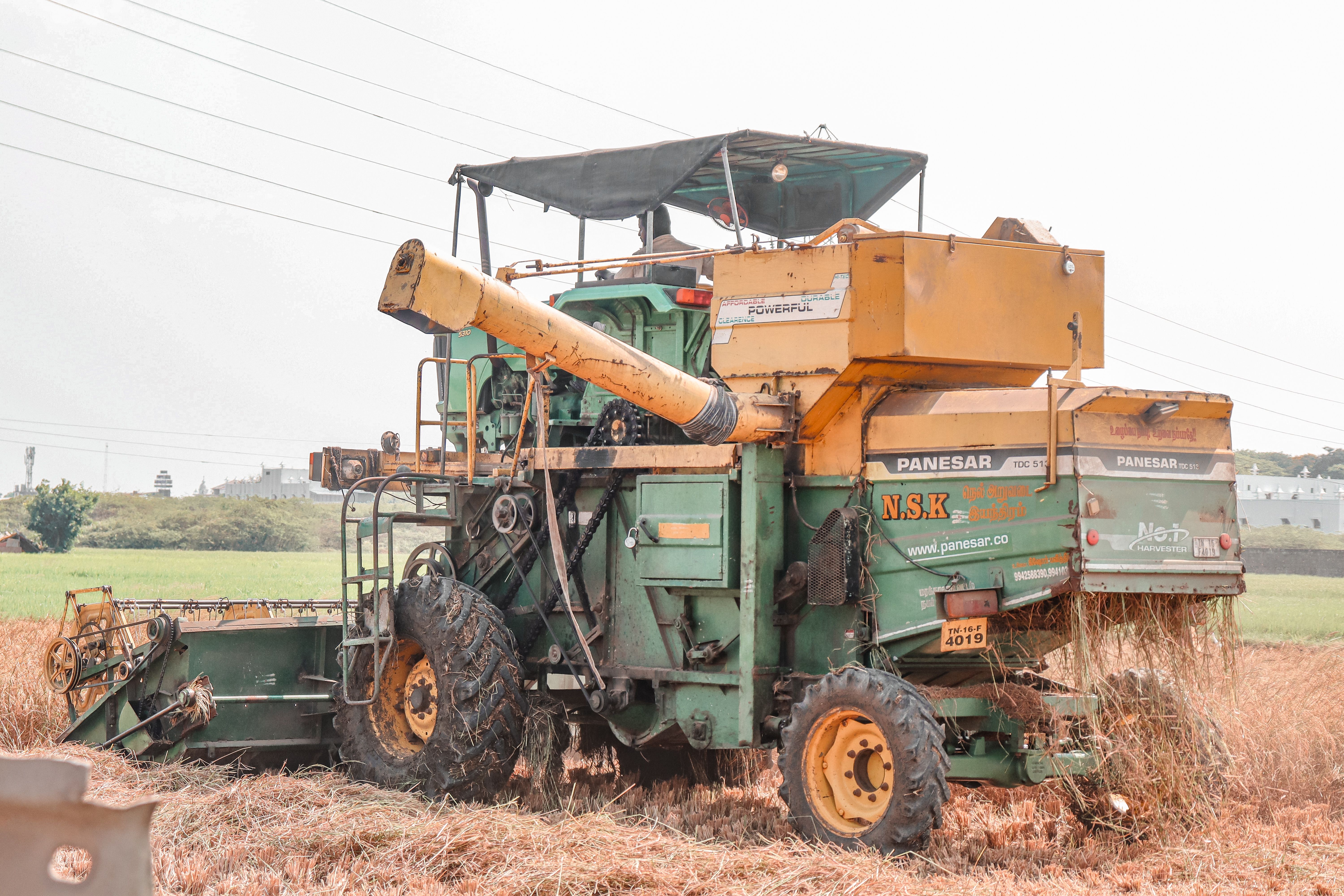 Agricultural combine artwork featured with the connected harvester telemetry case study.